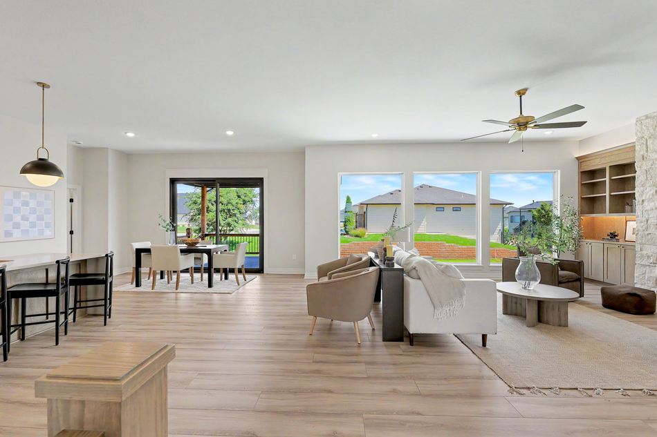 Living and dining area under vaulted ceilings at 2591 N Doris Ct. — Wichita, KS