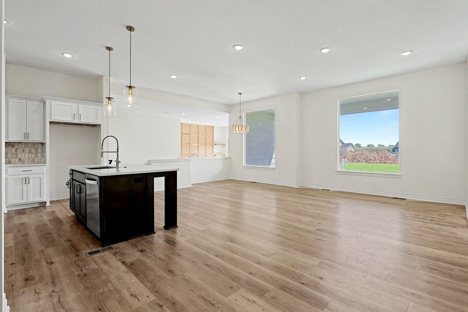 Kitchen island open to the great room at 2640 S Clear Creek St. — Wichita, KS
