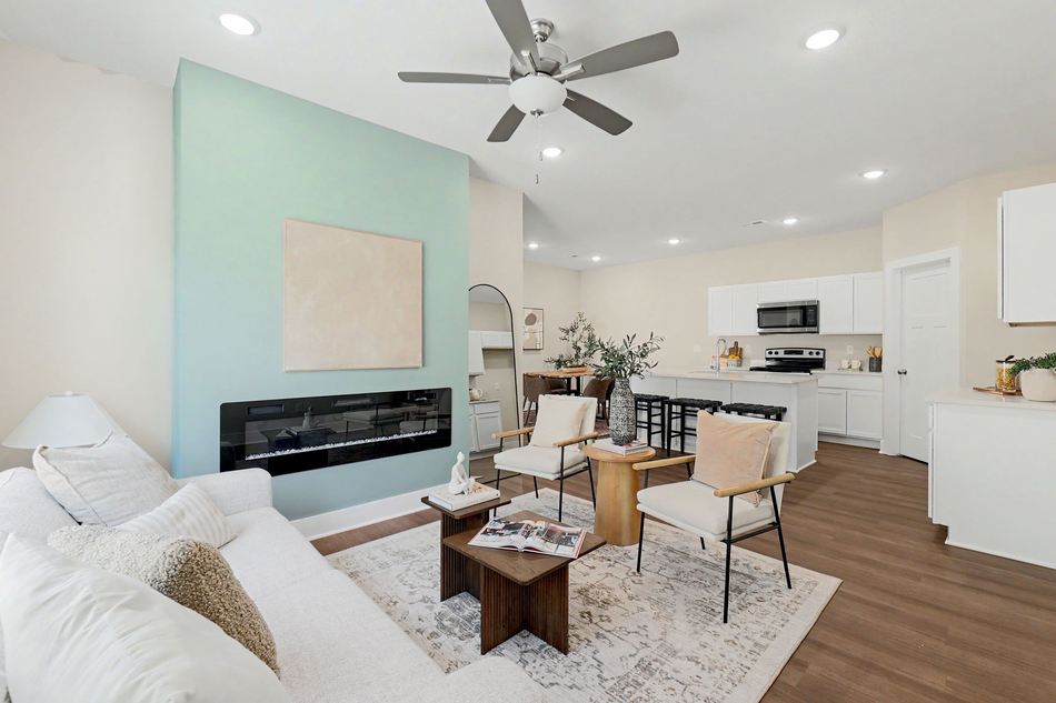 Great room with fireplace open to the kitchen at 2935 S Cedar Crest St. — Wichita, KS