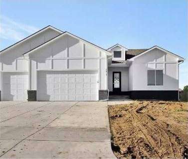 RJ Castle Homes new construction home in a Wichita, KS community with three-car garage