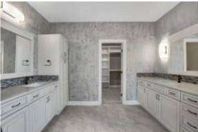 Master bath with double vanity and pass-through to walk-in closet – RJ Castle Homes – Wichita, KS