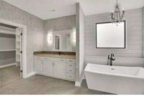 RJ Castle Homes master bath with freestanding soaking tub – Wichita, KS